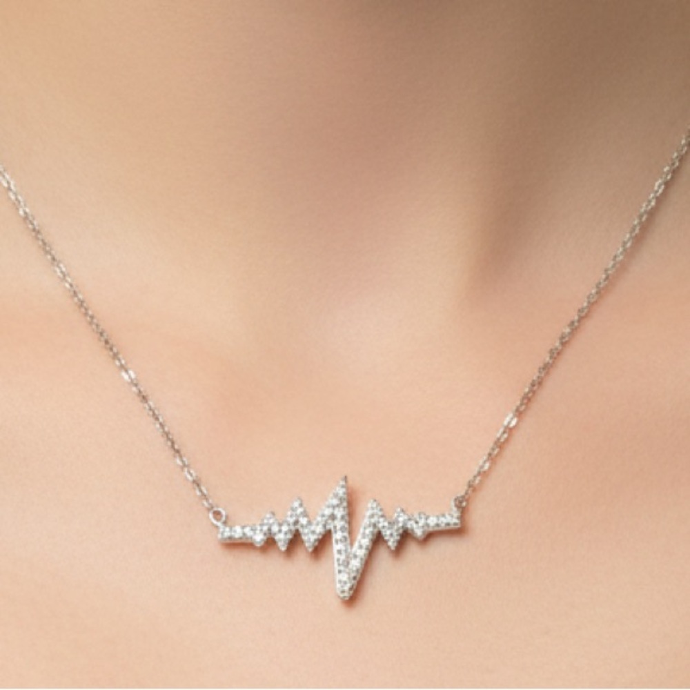 Sterling Silver .20cts Diamond Heartbeat with Chain Necklace
